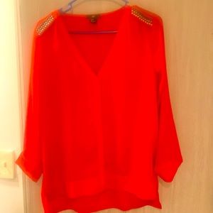 Bright red b-nick blouse with embellished shoulder (gold, silver, black)